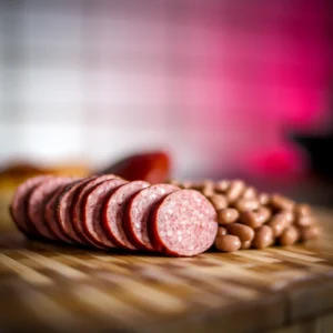 Smoked-sausage-sliced-and-plated-with-beans